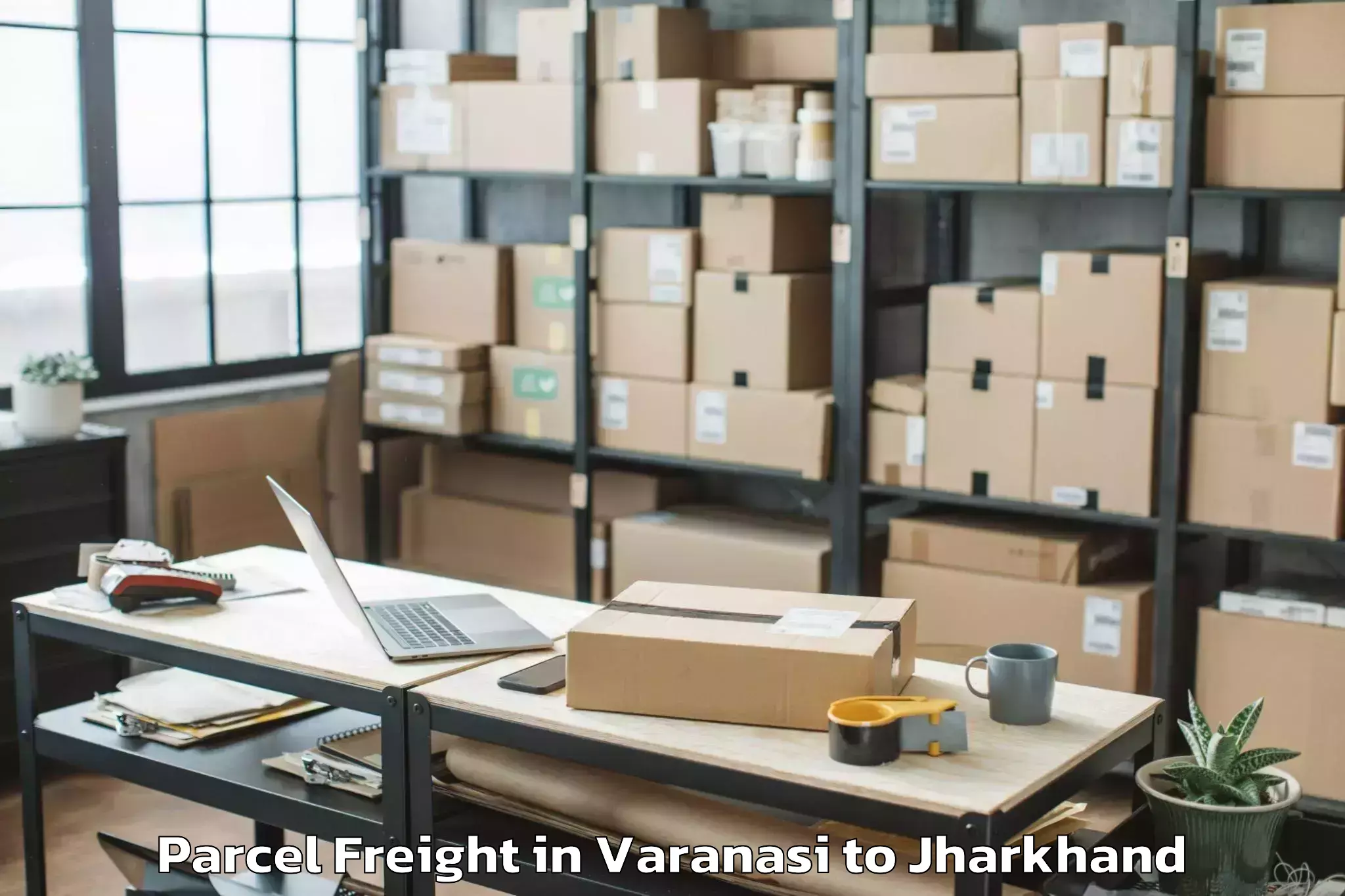 Book Varanasi to Mahagama Parcel Freight Online